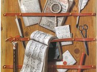 Various items like sheet music, newspaper, scissors, and books are neatly organized on a wooden panel.
